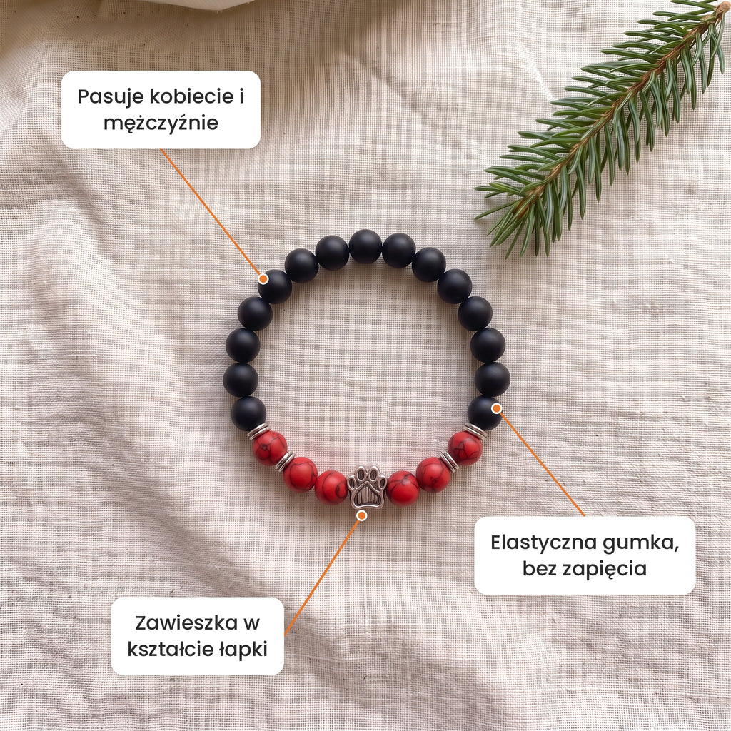 Cechy: Bransoletka Wieczorna Łuna. Zawieszka w kształcie łapki, elastyczna gumka bez zapięcia, pasuje kobiecie i mężczyźnie