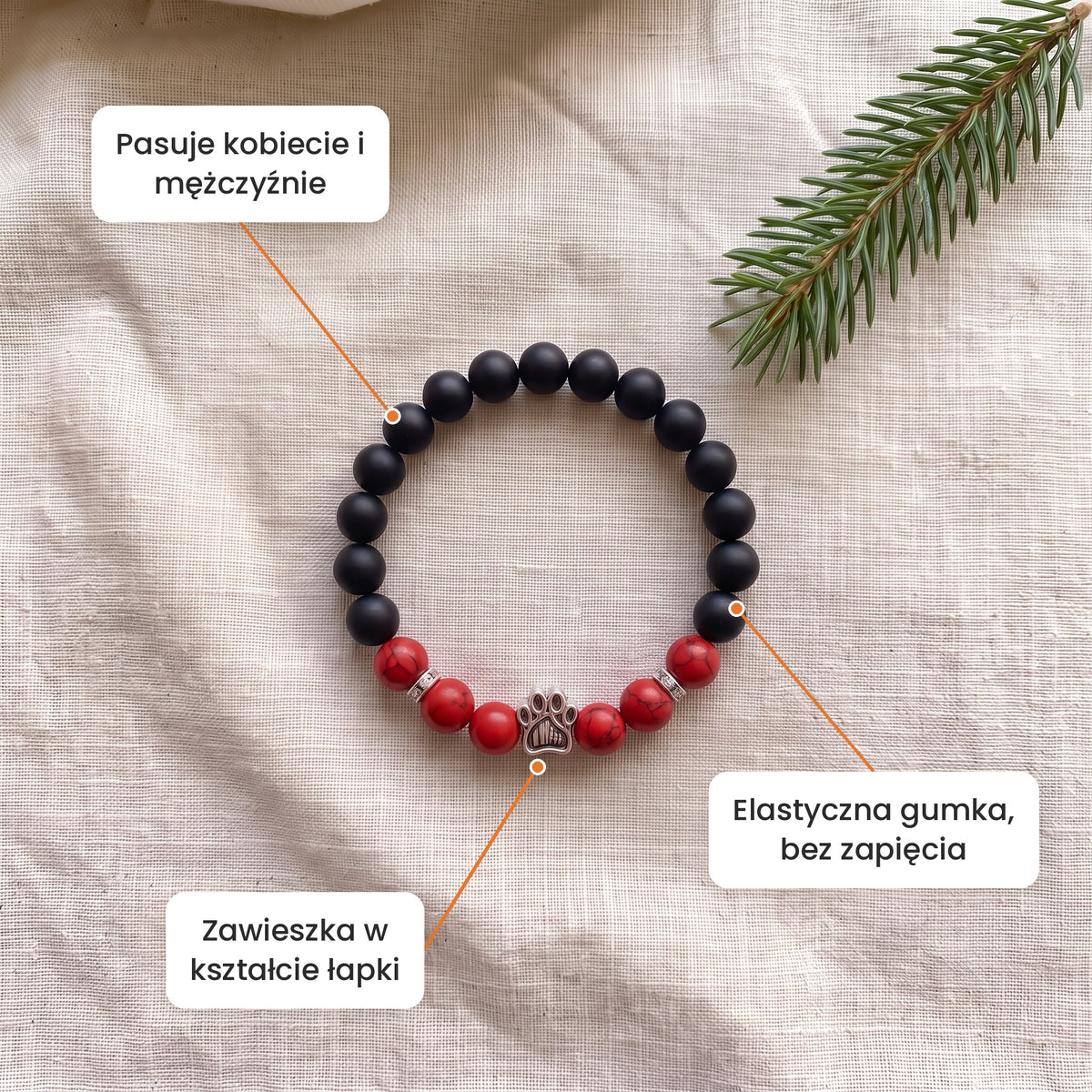 Cechy: Bransoletka Jarzębina. Zawieszka w kształcie łapki, elastyczna gumka bez zapięcia, pasuje kobiecie i mężczyźnie