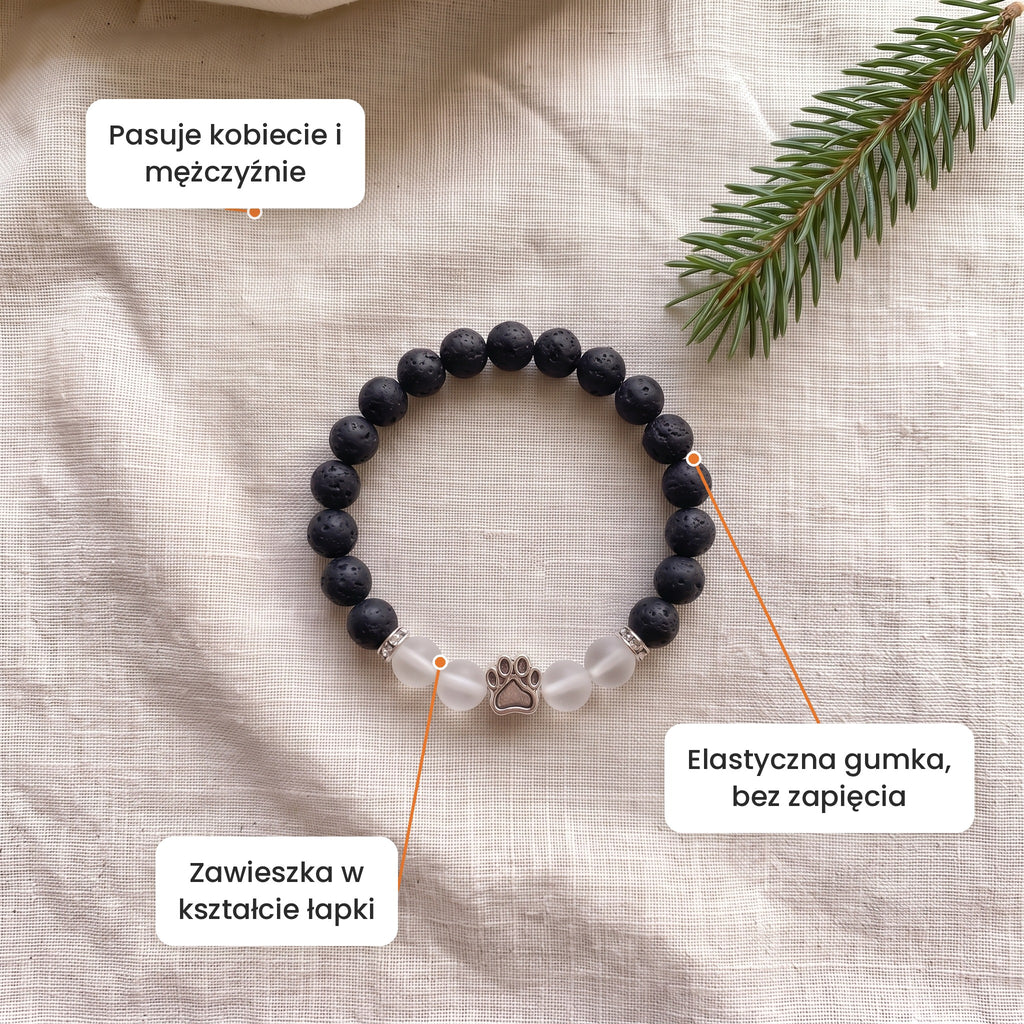 Cechy: Bransoletka Księżycowa Noc. Zawieszka w kształcie łapki, elastyczna gumka bez zapięcia, pasuje kobiecie i mężczyźnie