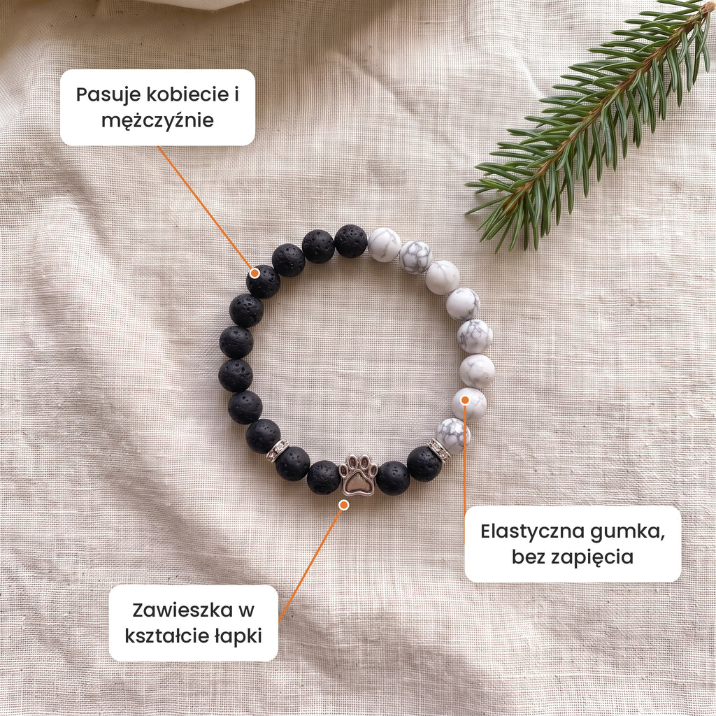 Cechy: Bransoletka Przedświt. Zawieszka w kształcie łapki, elastyczna gumka bez zapięcia, pasuje kobiecie i mężczyźnie